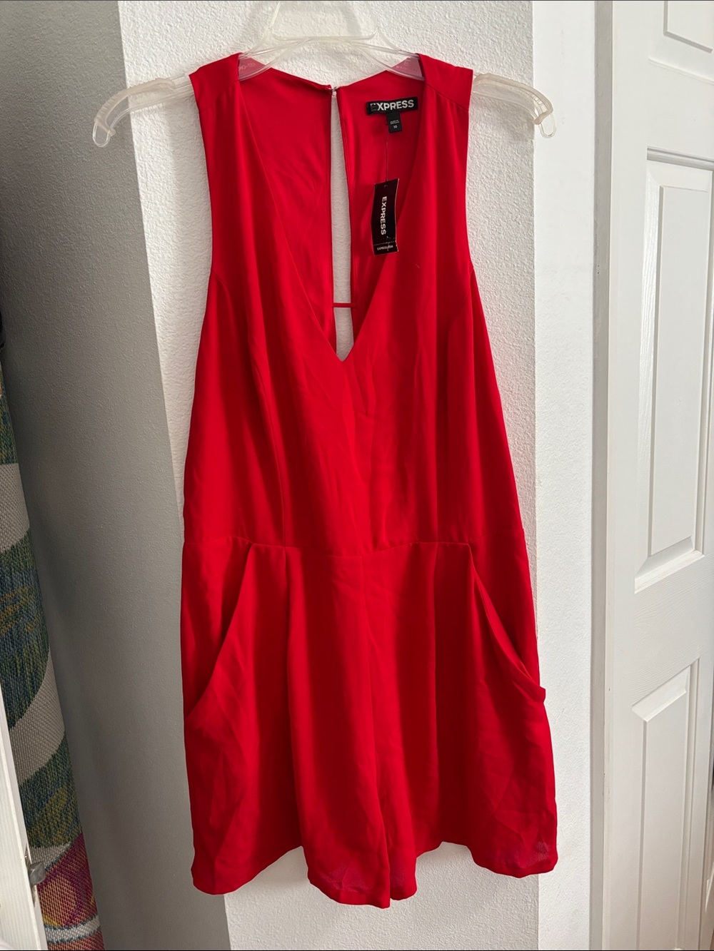 Express Sleeveless Romper in Bright Red with Deep V and Cute Back